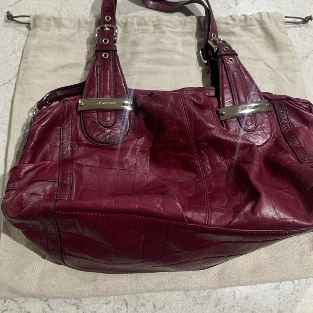 Makowsky bag. Maroon/Burgundy color. Used like new. Genuine leather